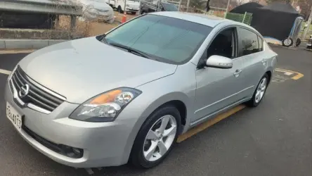 Nissan Altima 2009 г. 123456 км